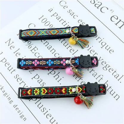 Adjustable cat collar with tassels and bells