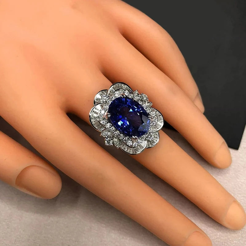 Luxury Women Rings with Oval Blue Flower Design
